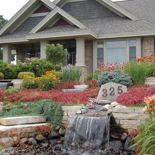 Photo of a traditional garden in Minneapolis with with waterfall.