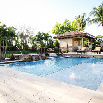 Roman/Geometric Pool with Spa & Water Features Including Sun Shelf in Boynton Be