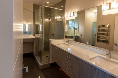 Bathroom - modern bathroom idea in Other with an undermount sink, flat-panel cabinets and quartz countertops