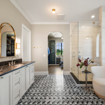 Vaulted Primary Suite with Straightened Vanity Wall and Arched Walk-through