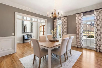 Example of a transitional dining room design in Atlanta