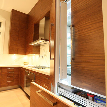Flat, Dark walnut veneer Doors and Concealed Fridge Panels