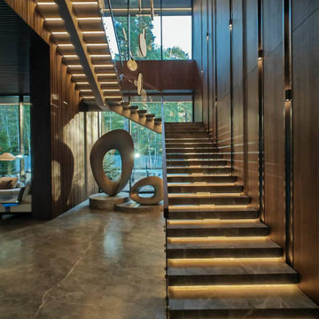 Suspended Stone Staircase with Step Recessed Lighting