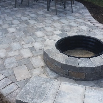 Unilock Brussels Patio w/ an Oaks Colonnade Border & Unilock Seat Wall & Firepit