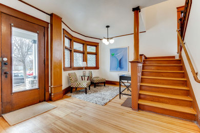 Example of an arts and crafts entryway design in Minneapolis