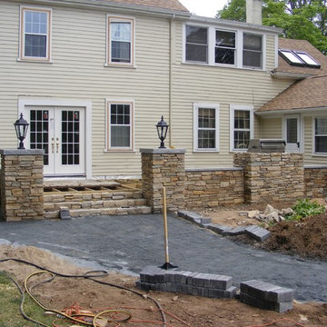 Deck and stone wall.