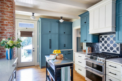 Photo of a small traditional kitchen in Cincinnati with green cabinets, engineered stone countertops, blue splashback, ceramic splashback, stainless steel appliances, marble flooring, an island, white floors, white worktops and exposed beams.