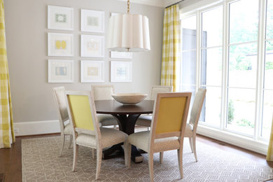 Example of a transitional dining room design in Charlotte