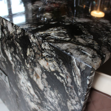 Elegant Modern Kitchen with Black Granite Island by Kudos Interior Designs