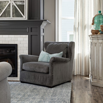 Mirrored TV Concealer with Gray Fireplace Family Room