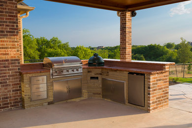 Eat-in kitchen - transitional l-shaped eat-in kitchen idea in Dallas with an integrated sink, concrete countertops, red backsplash, ceramic backsplash and stainless steel appliances