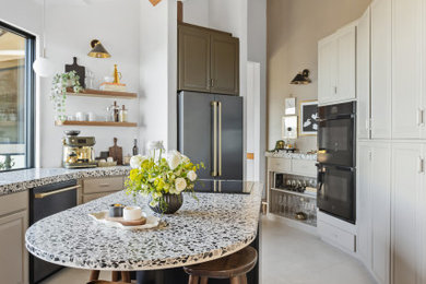 Example of a mid-century modern kitchen design in Seattle