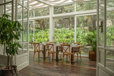 Example of an eclectic home design design in Other
