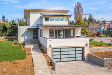 Example of a transitional exterior home design in Seattle