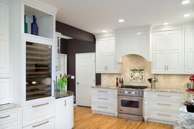 Elegant kitchen photo in Kansas City with stainless steel appliances