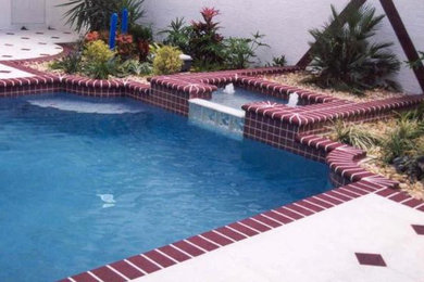 Example of a beach style pool design in Minneapolis