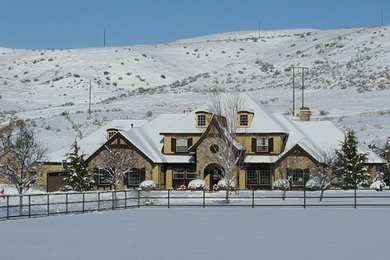 Example of a large arts and crafts house exterior design in Boise