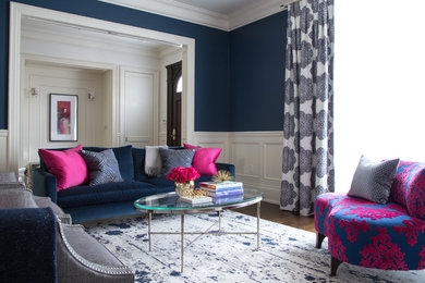 Inspiration for a transitional dark wood floor living room remodel in Toronto with blue walls
