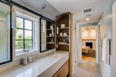 Large elegant master white tile and ceramic tile cement tile floor, multicolored floor and double-sink double shower photo in Seattle with flat-panel cabinets, medium tone wood cabinets, gray walls, an undermount sink, quartz countertops, a hinged shower door, white countertops and a floating vanity