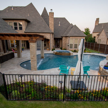 Transitional Curved Cool Pool with Amazing Water Features
