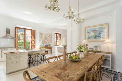 Inspiration for a mid-sized country open plan dining in Other with white walls, ceramic floors and no fireplace.
