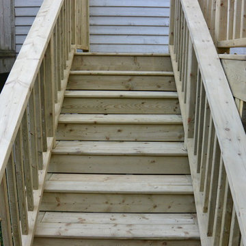 Deck with wrap around staircase