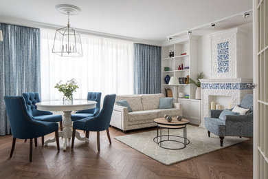 Dining room - mid-sized transitional medium tone wood floor and brown floor dining room idea in Moscow with white walls
