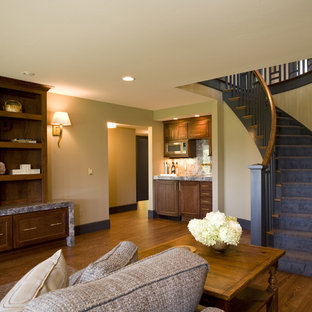 This is an example of a classic basement in Other with beige walls, medium hardwood flooring, no fireplace and orange floors.
