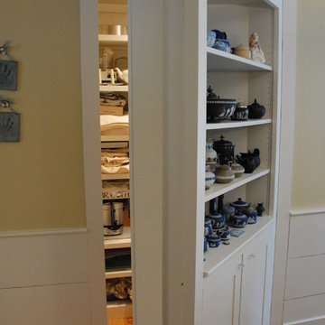 Dining room storage cupboard with a secret