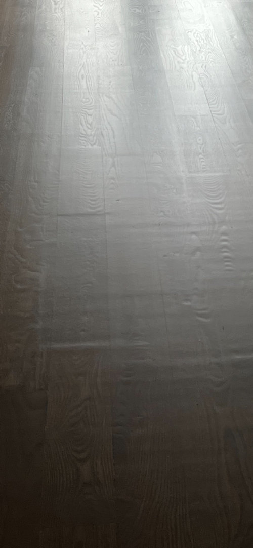 Should you be able to see waves in hardwood floors?