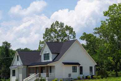 Example of a cottage exterior home design in Other
