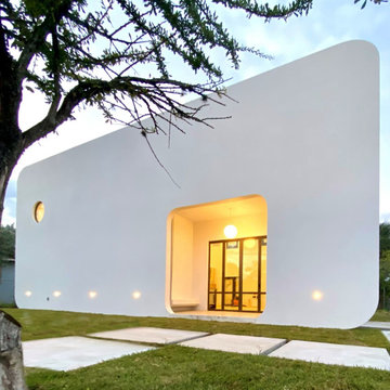The Miami Studio — A Sculptural Art-Studio ADU with Slim Folding Glass