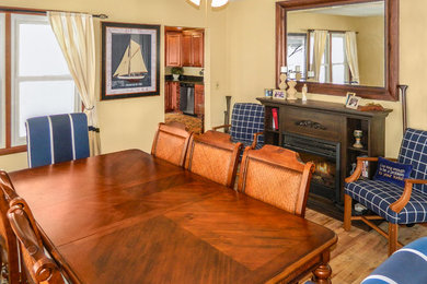 Example of a beach style dining room design in New York