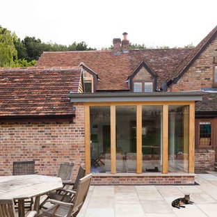 Inspiration for a medium sized modern exterior in Hertfordshire with metal cladding.