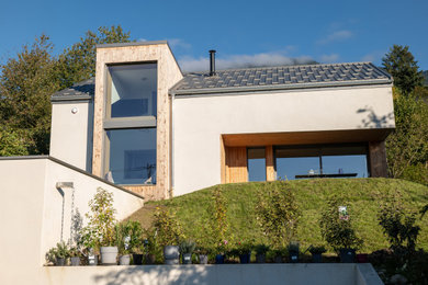 Inspiration pour une façade de maison.