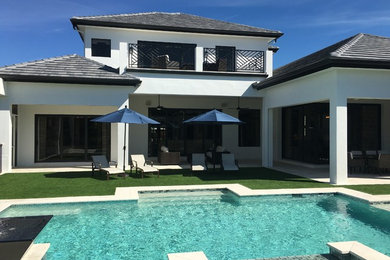Example of a trendy home design design in Miami