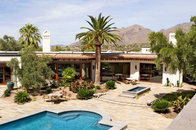 Southwestern exterior home idea in Phoenix