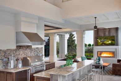 Large elegant galley ceramic tile and white floor eat-in kitchen photo in Salt Lake City with a single-bowl sink, granite countertops, multicolored backsplash, mosaic tile backsplash, stainless steel appliances, an island and gray countertops