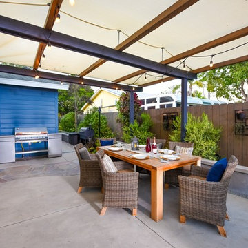 Outdoor Dining Area with Cover and Cafe Lights