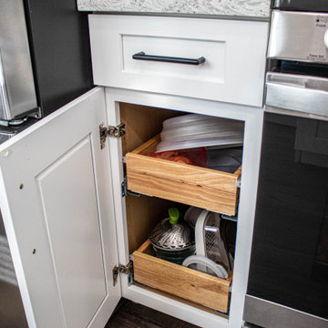 White and Gray Compact Kitchen with LVT Flooring