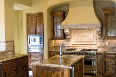 Example of a tuscan kitchen design in Phoenix