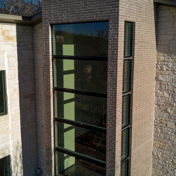 Milgard Black Fiberglass and Aluminum Windows and Doors - TX Lake House