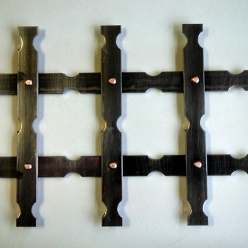 Klise #3400 style - punched custom grillework in steel w/ copper rivets