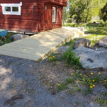 Entré av trall med solfjäder.