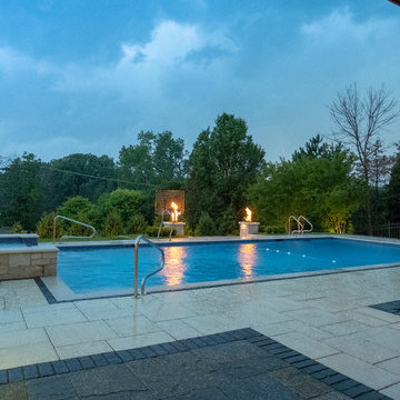 Burr Ridge Lap Pool with Raised Hot Tub and Waterfall