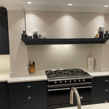 Modern monochrome handmade kitchen with full length larder