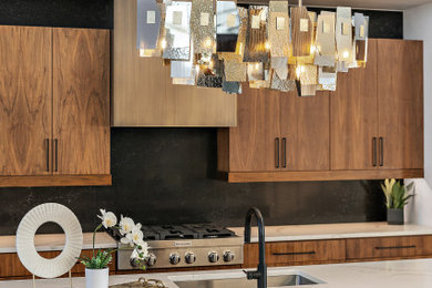Trendy kitchen photo in Denver with flat-panel cabinets, medium tone wood cabinets, quartz countertops and an island