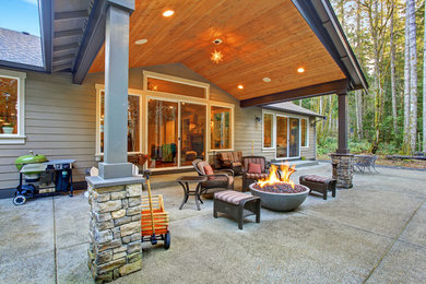 Inspiration for a large craftsman backyard concrete patio remodel in Los Angeles