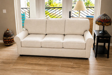 Beach style living room photo in Miami