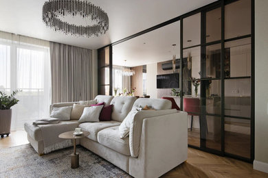 Идея дизайна: объединенная гостиная комната в белых тонах с отделкой деревом в современном стиле с бежевым полом и панелями на стенах